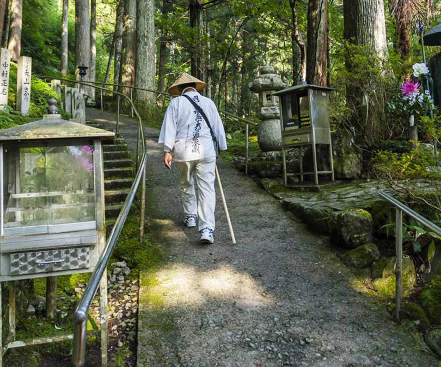 Japan, Shikoku, Ehime Region, Kumakogen, Man walking to Iwayaji Temple. (Photo by: JTB/UIG via Getty Images)